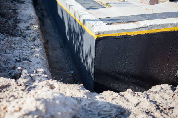 Professional Interior Drainage System technician working in Glencoe, AL